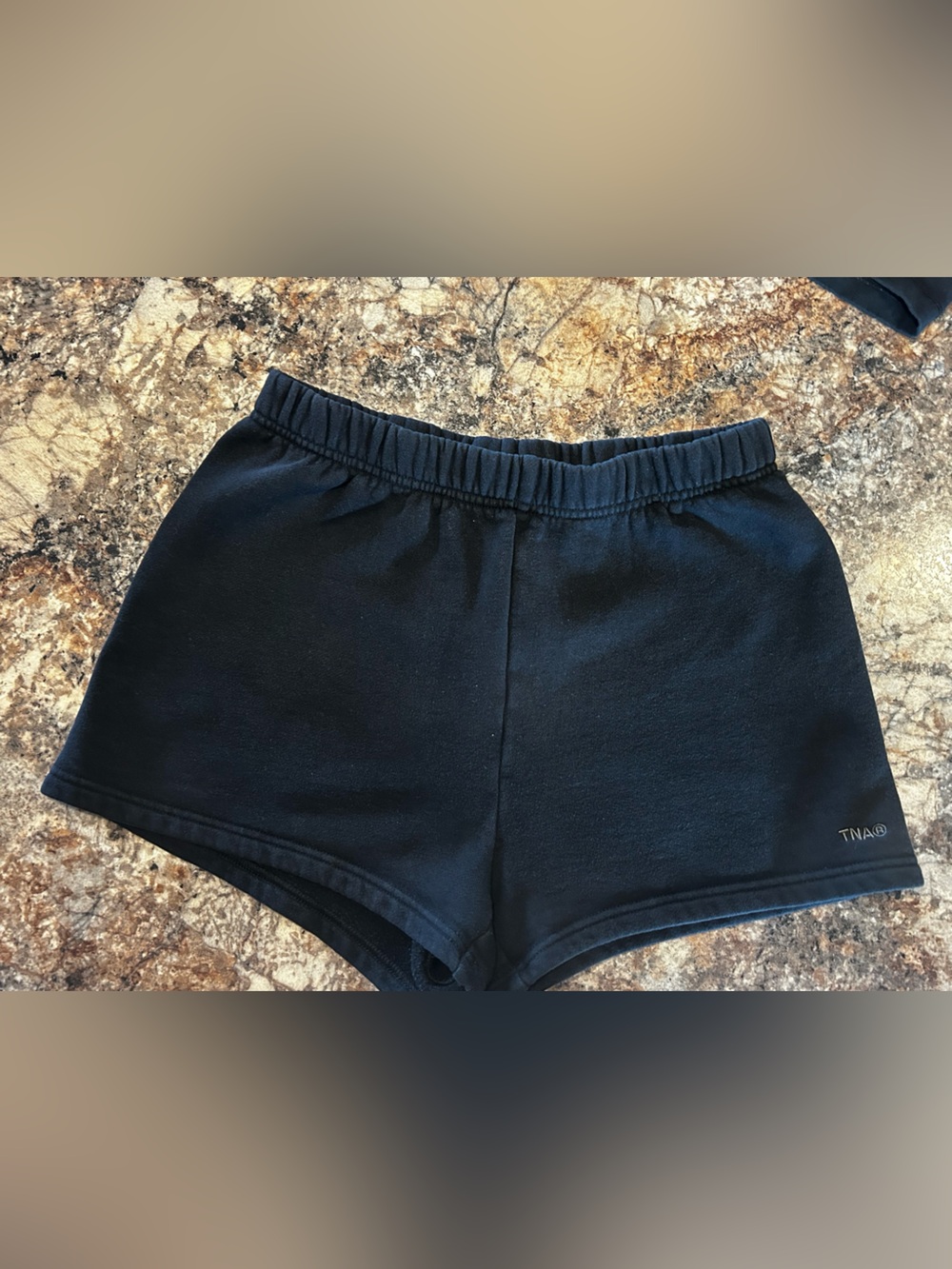 TNA/Aritzia Sweatfleece Cozy Fleece “Perfect Fit” shorts, size Small, in black